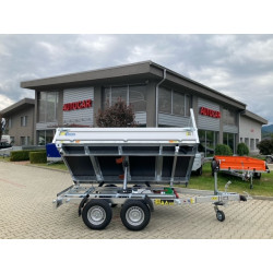 Remorcă basculabilă pe trei...